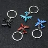 Mini airplanes - keyrings - multiple coloursSleutelhangers