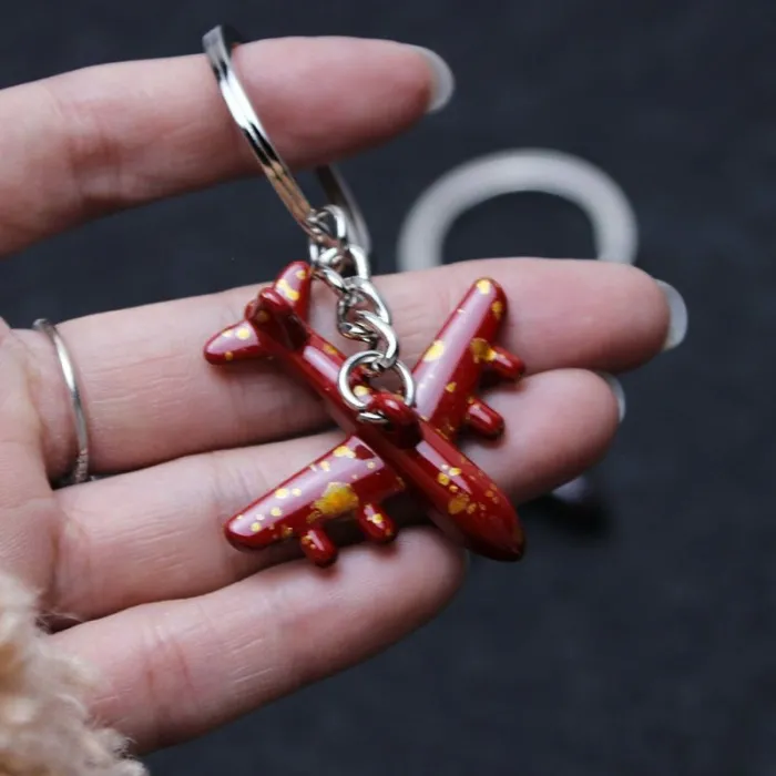 Mini airplanes - keyrings - multiple coloursSleutelhangers