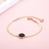 Rose gold bracelet - black round pendant with Roman numeralsBracelets