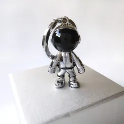 Modieuze handgemaakte sleutelhanger - met 3D astronaut - ruimterobotSleutelhangers