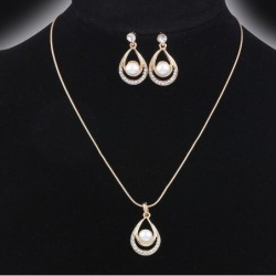 Elegante gouden sieradenset - halsketting / oorbellen - hanger met waterdruppel - met kristallen / parelSieradensets