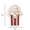 Perlenbrosche in Popcornform - mit Strasssteinen