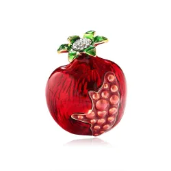 Elegante broche met rode granaatappelBroches