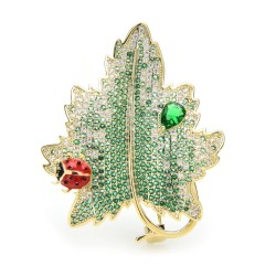 Luxuriöse Kristallbrosche - roter Käfer / grünes Blatt