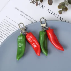 Dubbele rode/groene chilipeper - sleutelhangerSleutelhangers