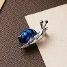 Blauwe kristallen slak - brocheBroches
