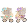 Crystal kitten op een fiets - sleutelhangerSleutelhangers