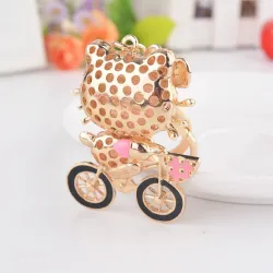 Crystal kitten op een fiets - sleutelhangerSleutelhangers