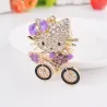 Crystal kitten op een fiets - sleutelhangerSleutelhangers