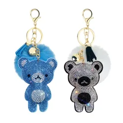 Kristallen teddybeer met pom pom van bont - sleutelhangerSleutelhangers