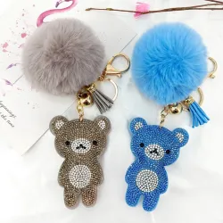 Kristallen teddybeer met pom pom van bont - sleutelhangerSleutelhangers