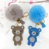 Kristallen teddybeer met pom pom van bont - sleutelhangerSleutelhangers