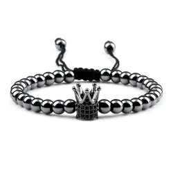 Armband van koperen kralen met een kroontje - verstelbaar koordArmbanden