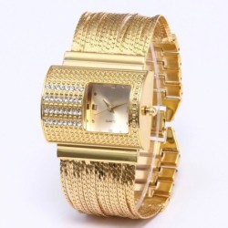 Luxe Quartz horloge met kristallen - brede gouden armbandHorloges