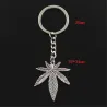 Metalen sleutelhanger met hanger van esdoornbladSleutelhangers