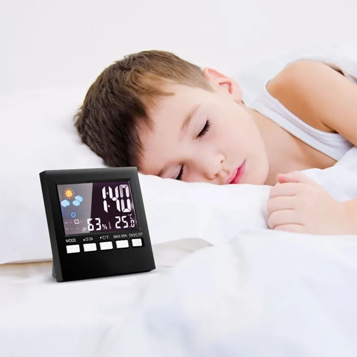 LCD digital alarm clock with backlightClocks