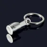 Silver engine pistol keychain keyringSleutelhangers