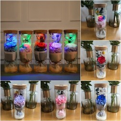Bouquet of infinity roses in a glass vase with LED lightKerstmis