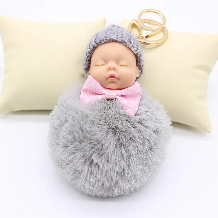 Slapende babypop - sleutelhangerSleutelhangers