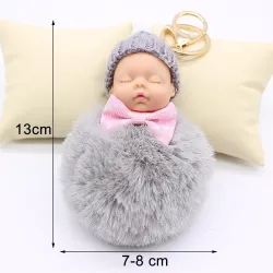 Slapende babypop - sleutelhangerSleutelhangers