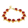 Gold & silver bracelet with red rosesArmbanden