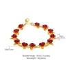 Gold & silver bracelet with red rosesArmbanden
