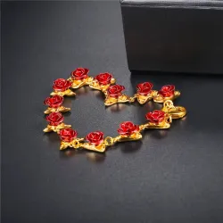 Gold & silver bracelet with red rosesArmbanden