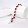 Gold & silver bracelet with red rosesArmbanden