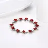 Gold & silver bracelet with red rosesArmbanden