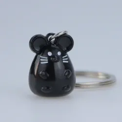 Metal keychain with a mouseSleutelhangers