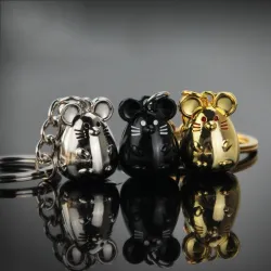 Metal keychain with a mouseSleutelhangers