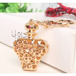 Gold crystal perfume bottle - keychainSleutelhangers