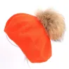 Elegant beret with fur pom-pomPetten & Hoeden
