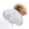 Elegant beret with fur pom-pomPetten & Hoeden